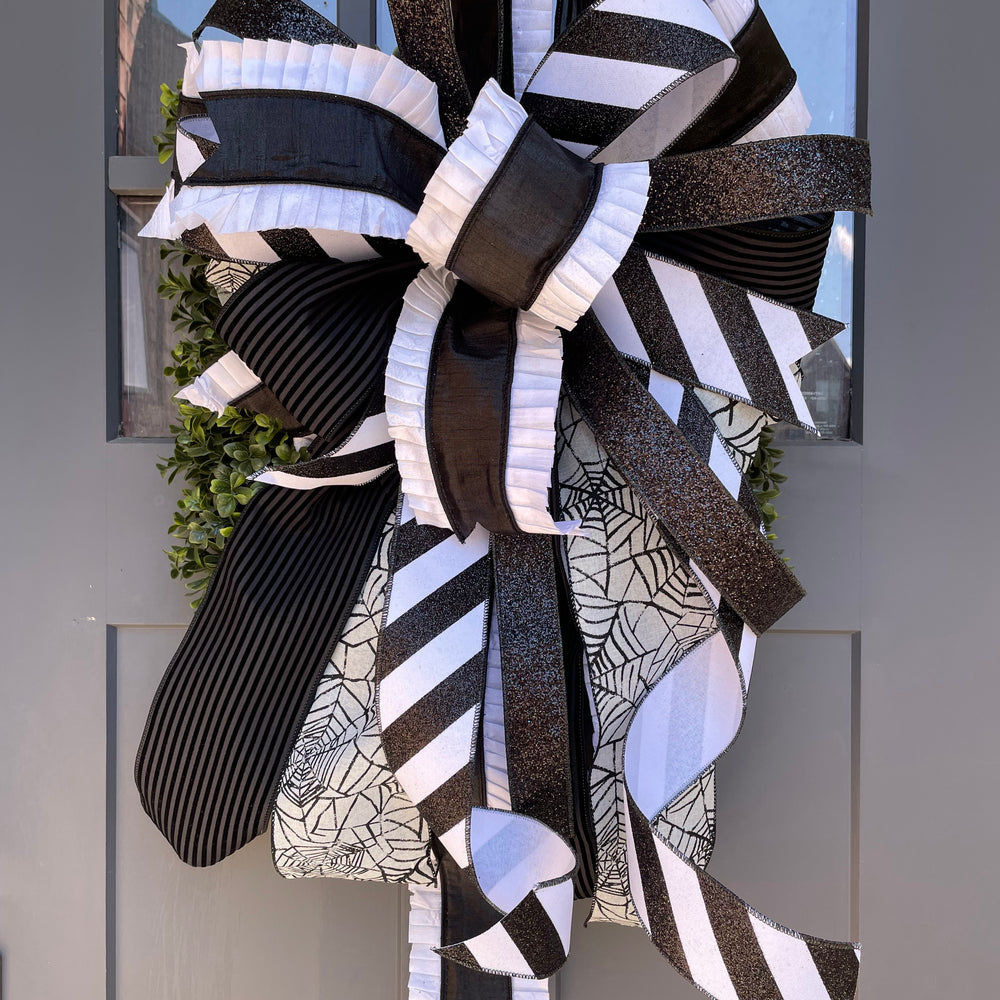 
                      
                        Black & White Hallowen Hand Tied Bow
                      
                    